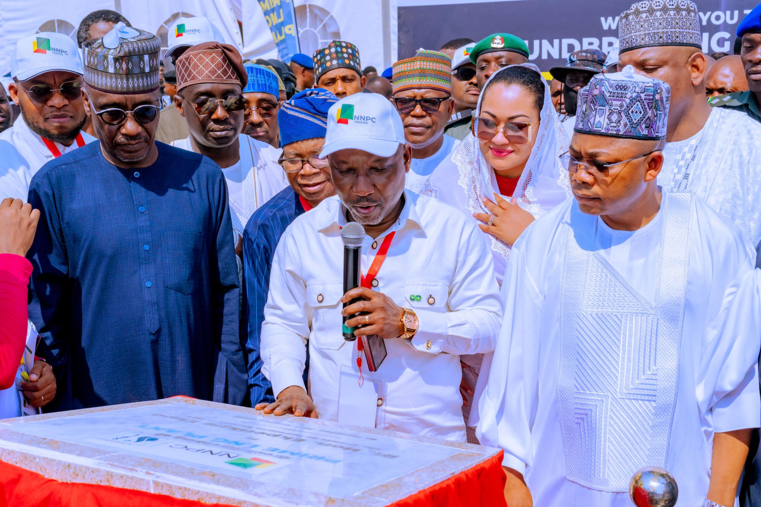 Minister of State for Petroleum Resources (Gas) Rt. Hon. Ekperikpe Ekpo speaks during the groundbreaking ceremony of 5 Mini-LNG Plants in Ajaokuta, Kogi State, on Thursday. The Minister is flanked by the Kogi State Governor, Ahmed Usman Ododo (1st right); Chairman, NNPC Ltd Board, Chief Pius Akinyelure (2nd left) and GCEO, NNPC Ltd, Mele Kyari (1st left).